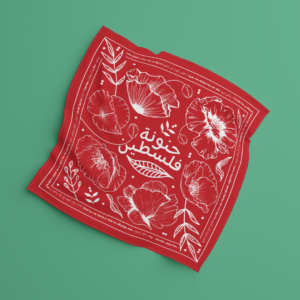 Paliacate rojo con ilustraciones de amapolas silvestres blancas, caligrafía árabe central "حنونة فلسطين" y versos del poema de Fadwa Tuqan bordeando todo el marco exterior en español y árabe.